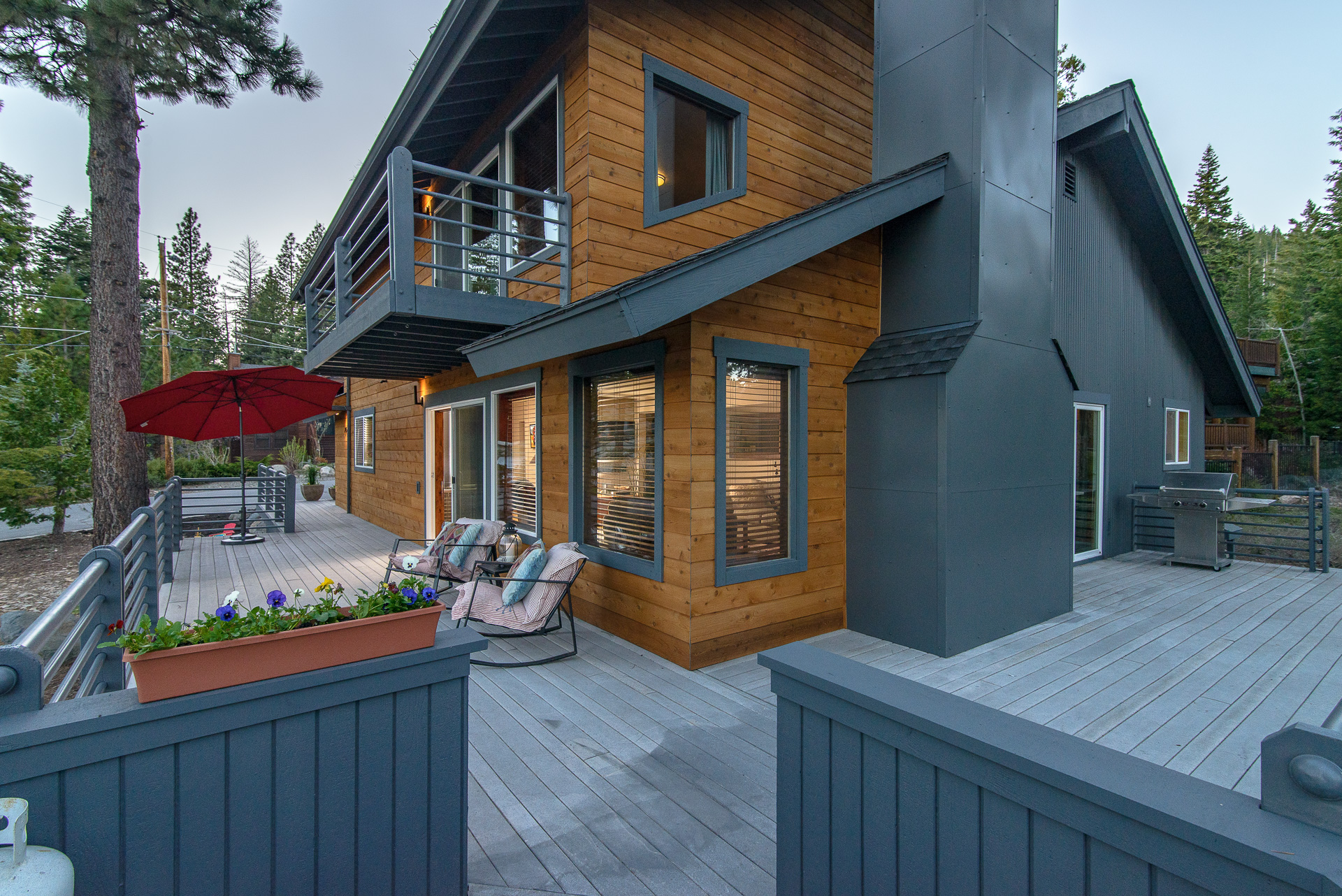 Wrap around balcony surrounding a two story home